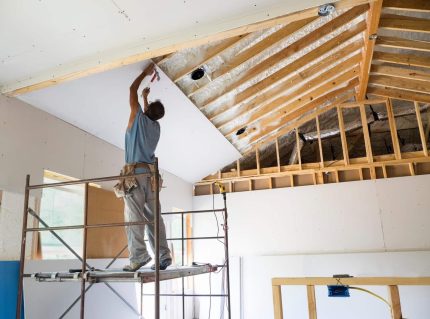 Sheet rock installation during home renovation in Long Island